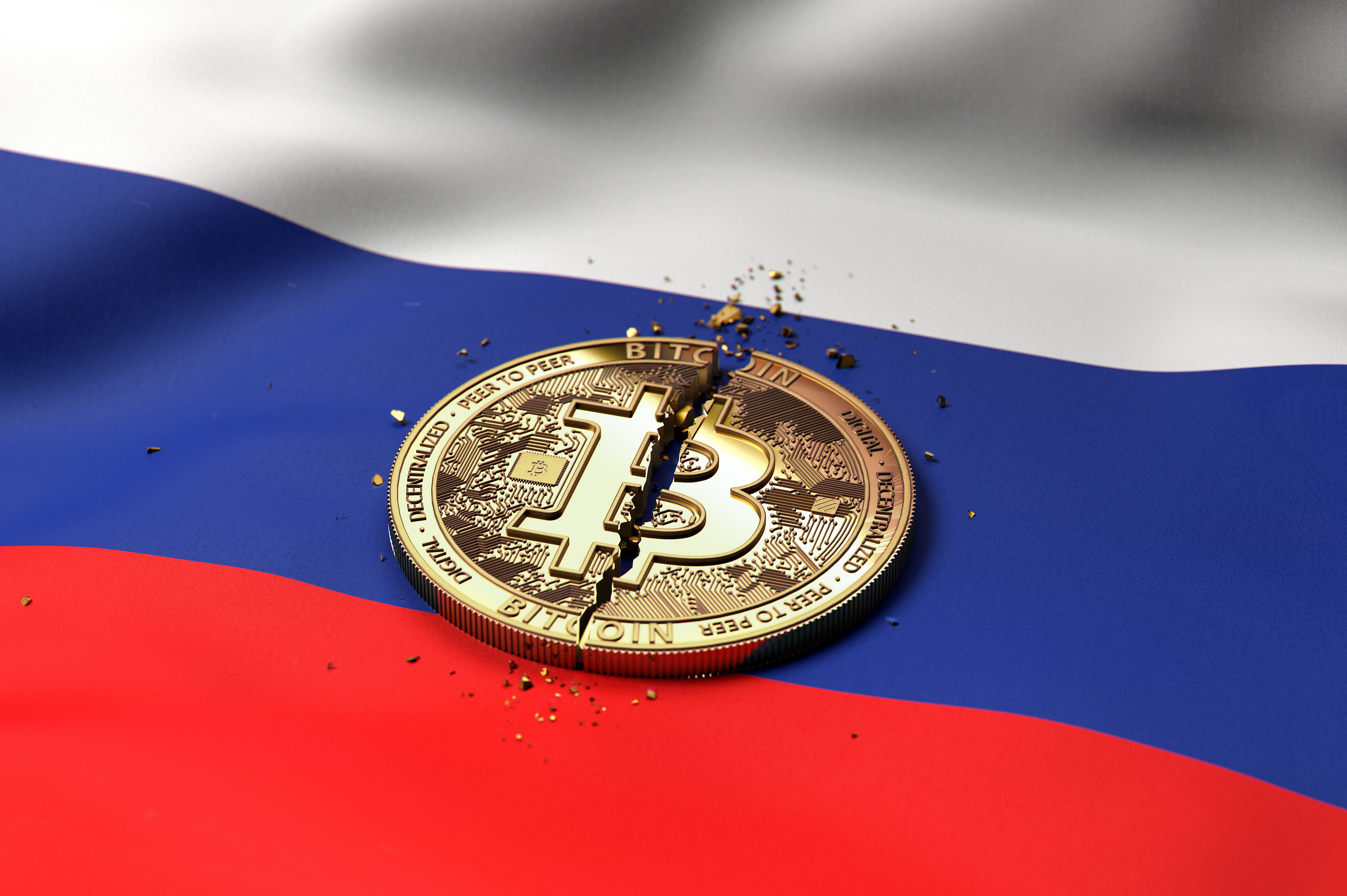 代表比特幣的破解代幣擱置在俄羅斯國旗上。