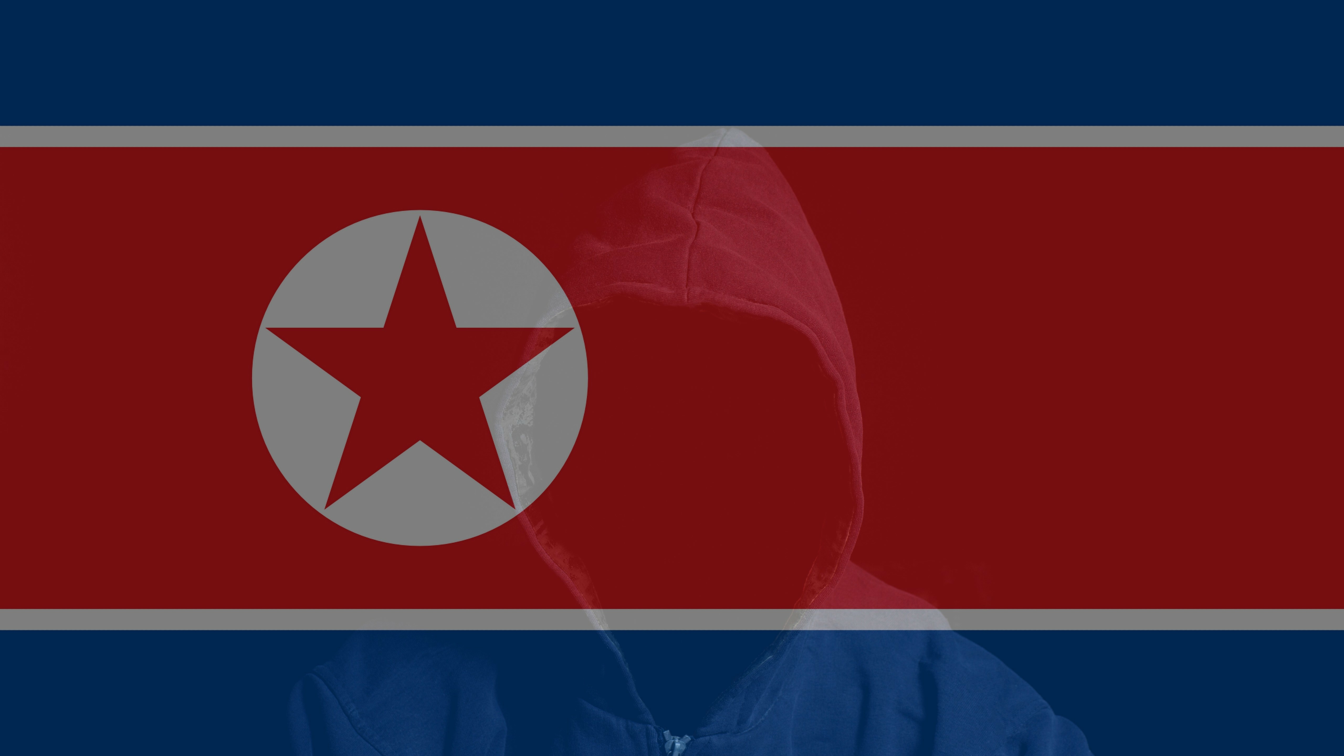 朝鮮國旗，前景中坐著一個蒙面人物。